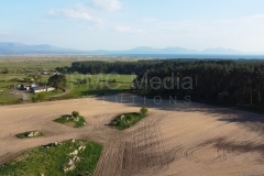 A ploughed field near Newborough Forest