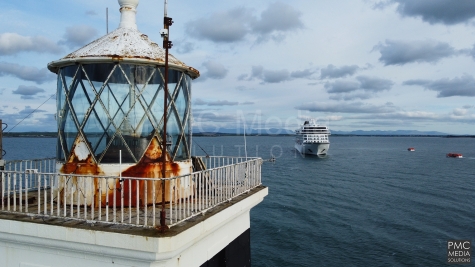Holyhead breakwater lighthouse and a Viking cruise ship.