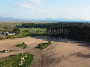 A ploughed field near Newborough Forest