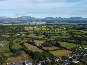 Caernarfon Castle and Snowdonia from Dwyran, Anglesey