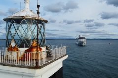 Holyhead breakwater lighthouse and a Viking cruise ship.