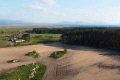 A ploughed field near Newborough Forest