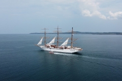 Sea Cloud Spirit heading out of Holyhead with sails up