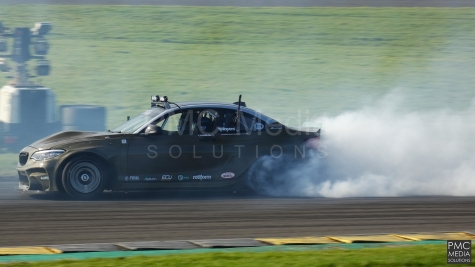 A BMW Making Lots of smoke while drifting at Anglesey Circuit
